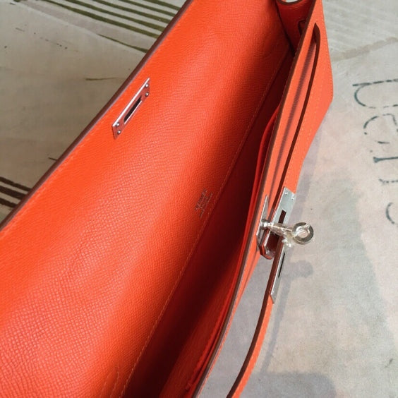 🔥 In Stock! Kelly Cut 31 Clutch – Vibrant Orange Epsom Leather, Premium Craftsmanship, Elegant Evening Bag 🍊
