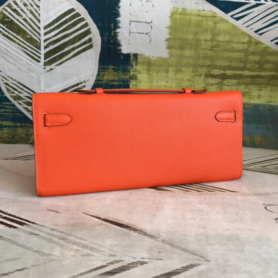 🔥 In Stock! Kelly Cut 31 Clutch – Vibrant Orange Epsom Leather, Premium Craftsmanship, Elegant Evening Bag 🍊